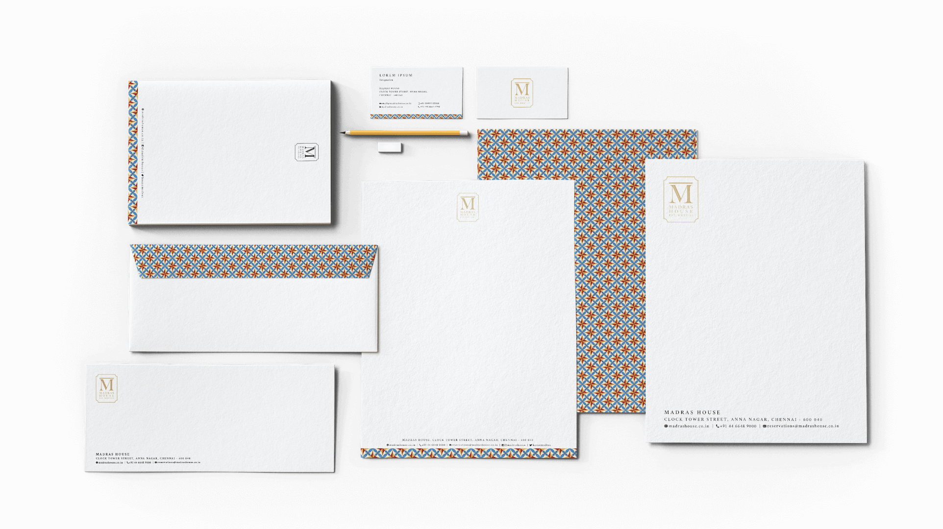 Mockups of stationary items designed for Madras House by Design Foundry